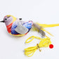 Colorful bird-shaped cat toy with a yellow string on a white background